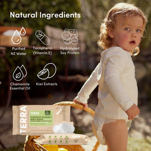 Child playing outdoors with Terra baby wipes packaging and natural ingredients listed.