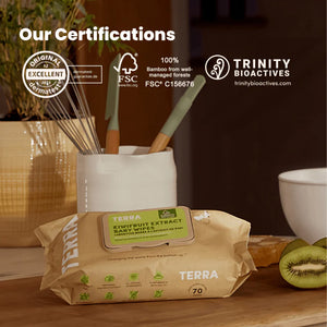 Terra baby wipes packaging with certifications displayed on a blurred background