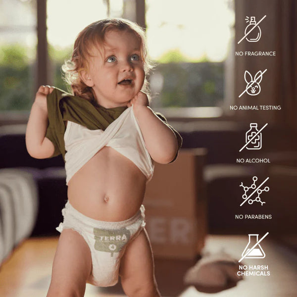 Child wearing a Terra brand diaper with ethical icons on the right side.