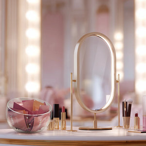 Gold vanity mirror with makeup products on a blurred background